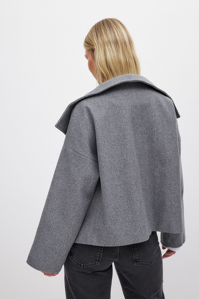 Women shawl button jacket, back view