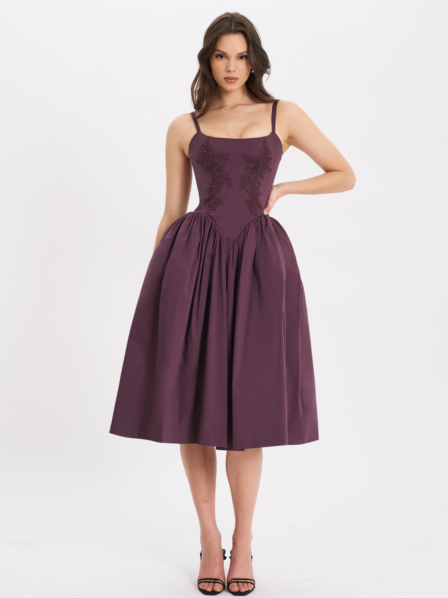 Purple lace midi dress with a sculpted bodice and pleated skirt — front view.