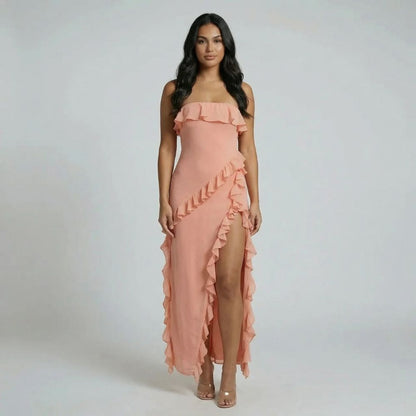Rose gold strapless ruffle maxi dress with high slit and flowing accents