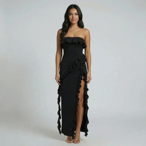 Black strapless ruffle maxi dress featuring a bandeau neckline and side slit