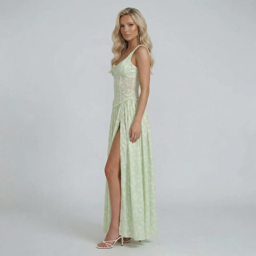 Green floral corset maxi dress — side angle showcasing lightweight flowy skirt and slit