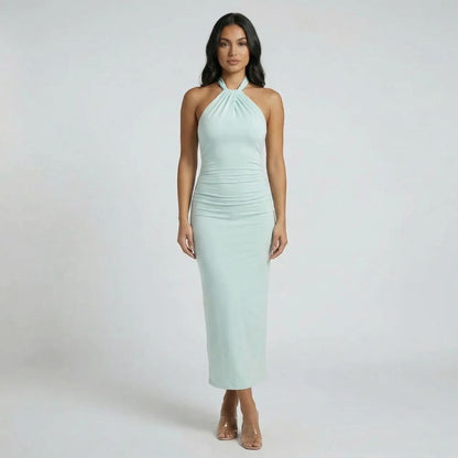 Mint halter ruched maxi dress — front view showing streamlined column silhouette.