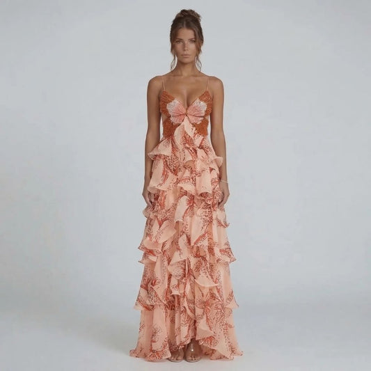 Peach tiered ruffle maxi dress with beaded butterfly bodice — front view showcasing deep V neckline.