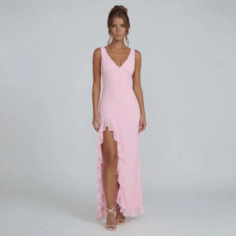 Pink ruffle maxi dress with cascading slit — styled front view for garden-party elegance