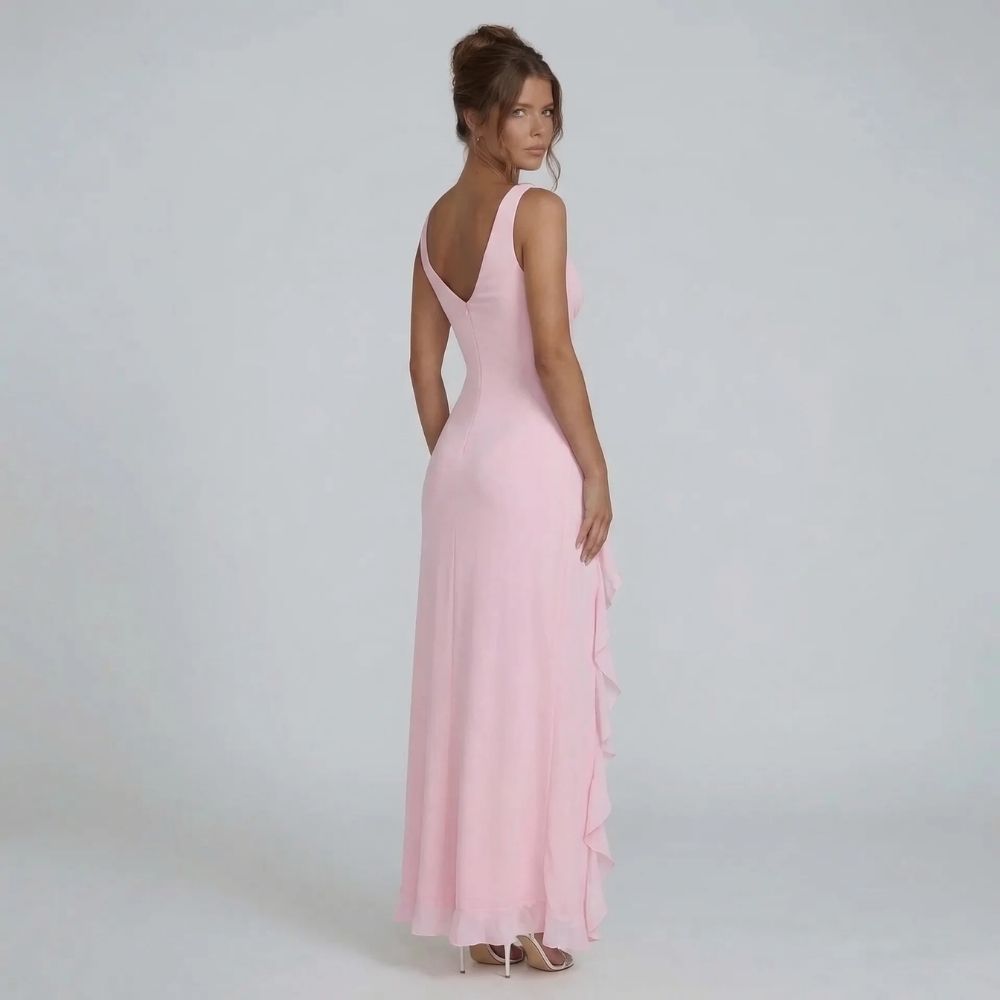 Pink maxi dress — back view showing tailored fit and flowing hem