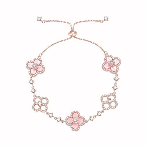 Rose gold floral bracelet with pink enamel clover motifs — front view