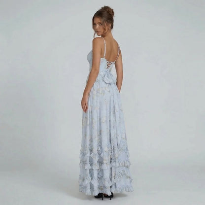Blue floral corset maxi dress — back view with lace-up adjustable bow detail