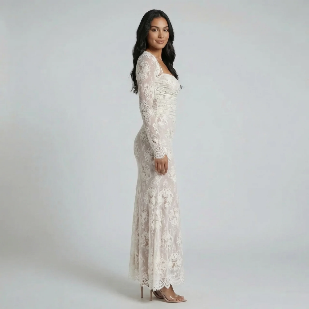 White lace maxi dress with square neckline and corset back — side view showcasing fitted silhouette.