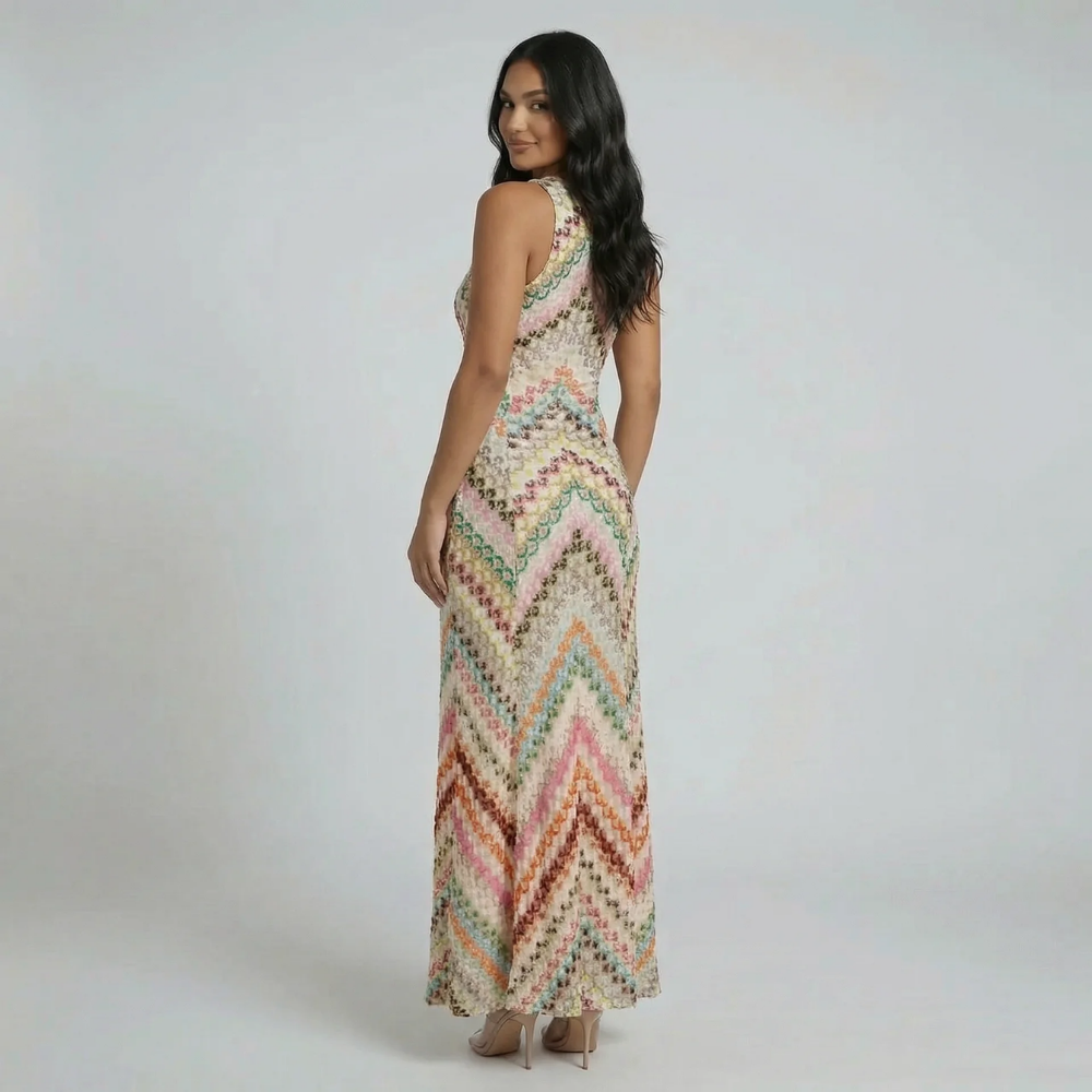 Multicolor chevron maxi dress — back view showing open crisscross detail and floor-length fit.