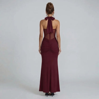 Burgundy halter ruched maxi dress — back view showcasing adjustable tie and ruched detailing