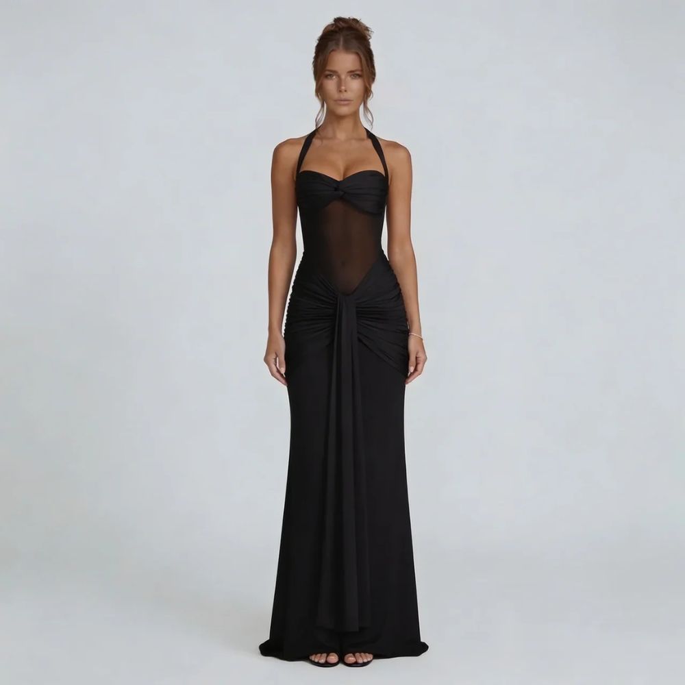 Black halter ruched maxi dress — front view with floor-length hem and mesh bodice accent