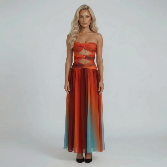 Ombre cutout maxi dress with sweetheart neckline — front view showcasing bold cutouts and flowing skirt.