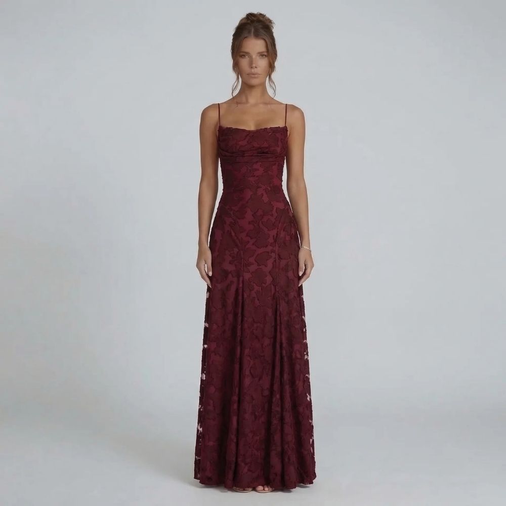 Red floral lace maxi dress with flowing skirt — styled front view.