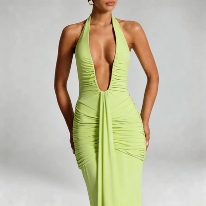 Sage ruched maxi dress — close-up of deep neckline with cascading front drape.