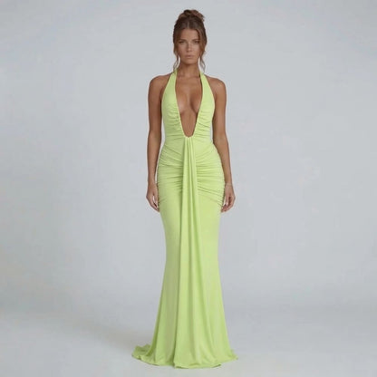 Sage ruched maxi dress with deep halter neckline — full front view showing ruching and drape detail.