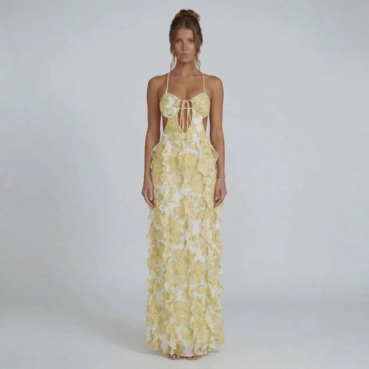 Yellow floral maxi dress with cascading ruffle layers and keyhole bust detail — front view