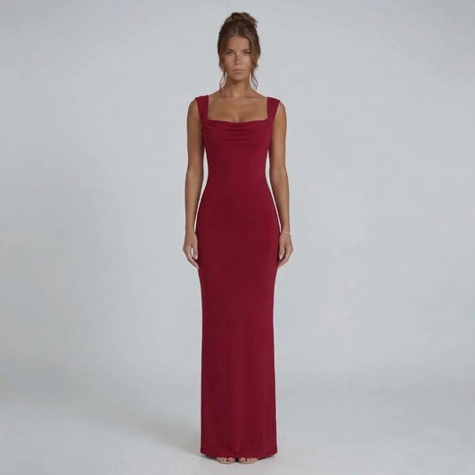 Red bow-back maxi dress featuring a draped neckline and curve-skimming silhouette — front view.