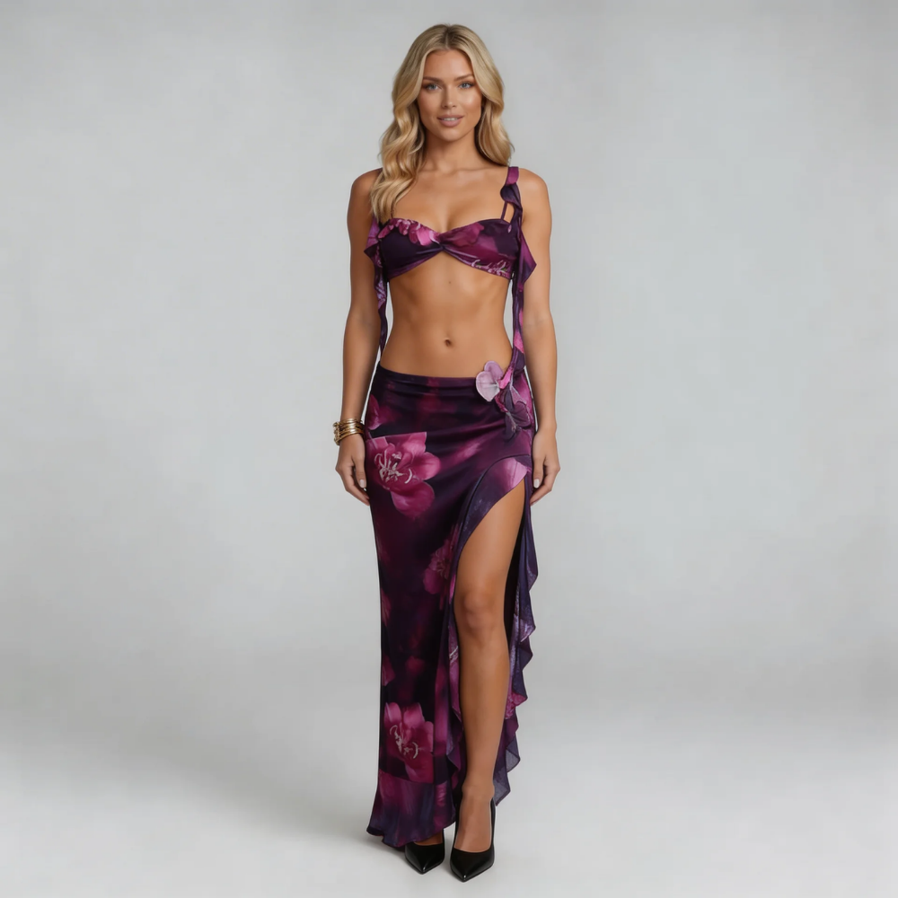 Purple floral two-piece maxi set with ruffled crop top and high-slit skirt — front view showcasing design details.