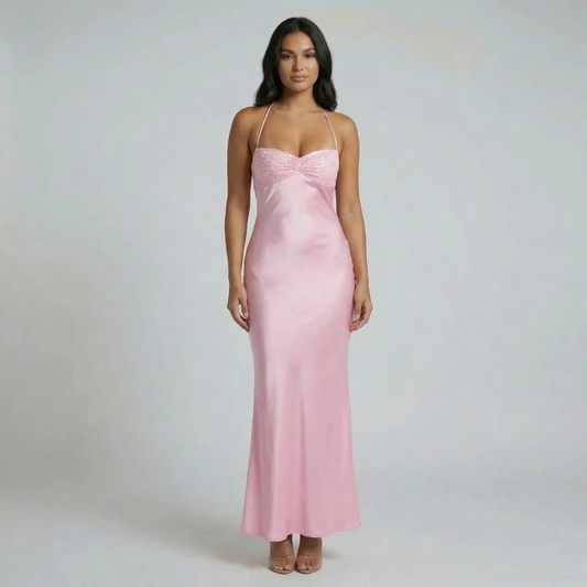 Pink beaded maxi dress with sweetheart neckline — front view showcasing shimmer finish and spaghetti straps.