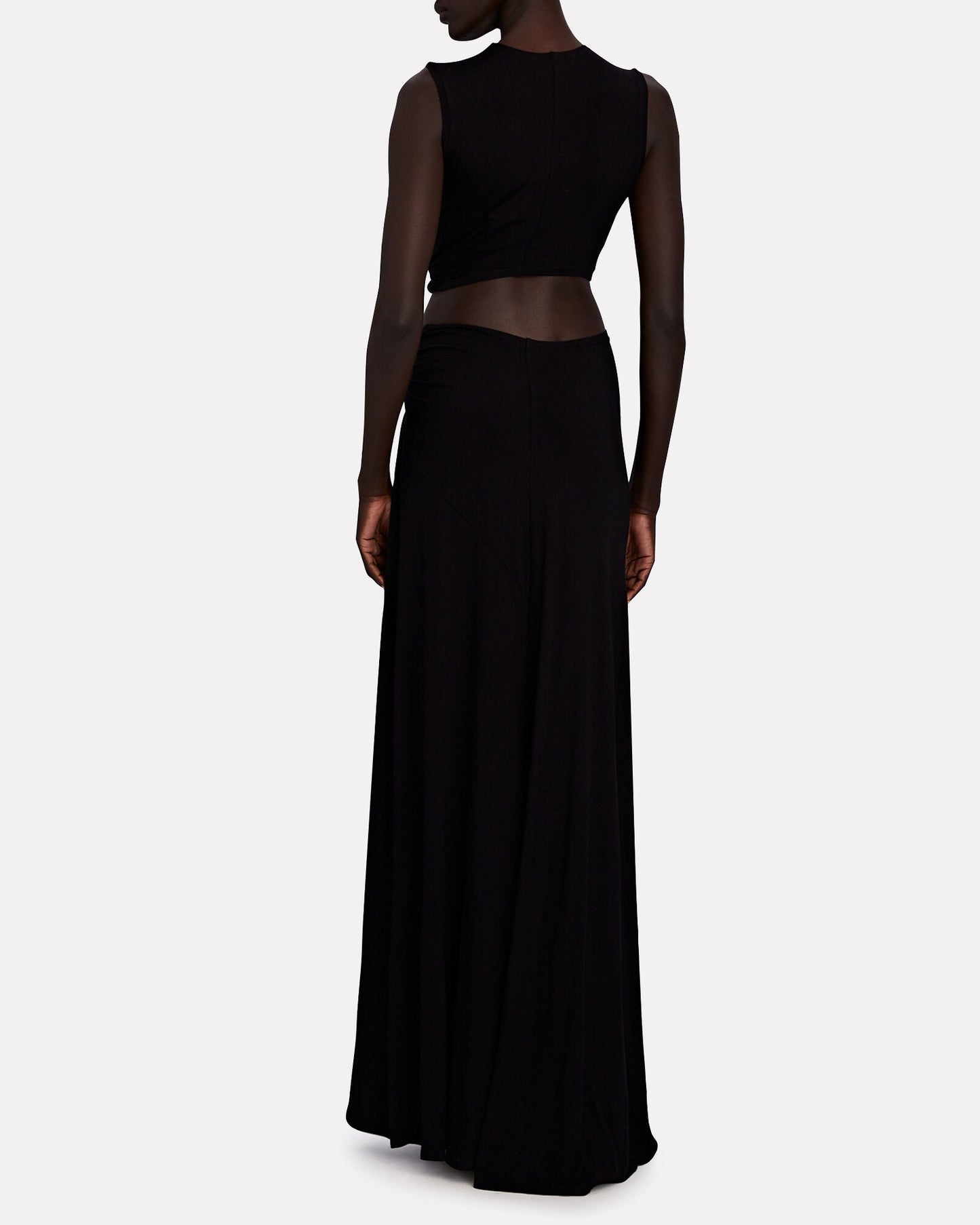 Black cutout maxi dress, detailed back view showing fitted top and smooth finish.