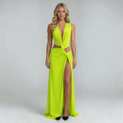 Green cutout maxi dress with plunging neckline, front view showcasing side slit and twist detail.