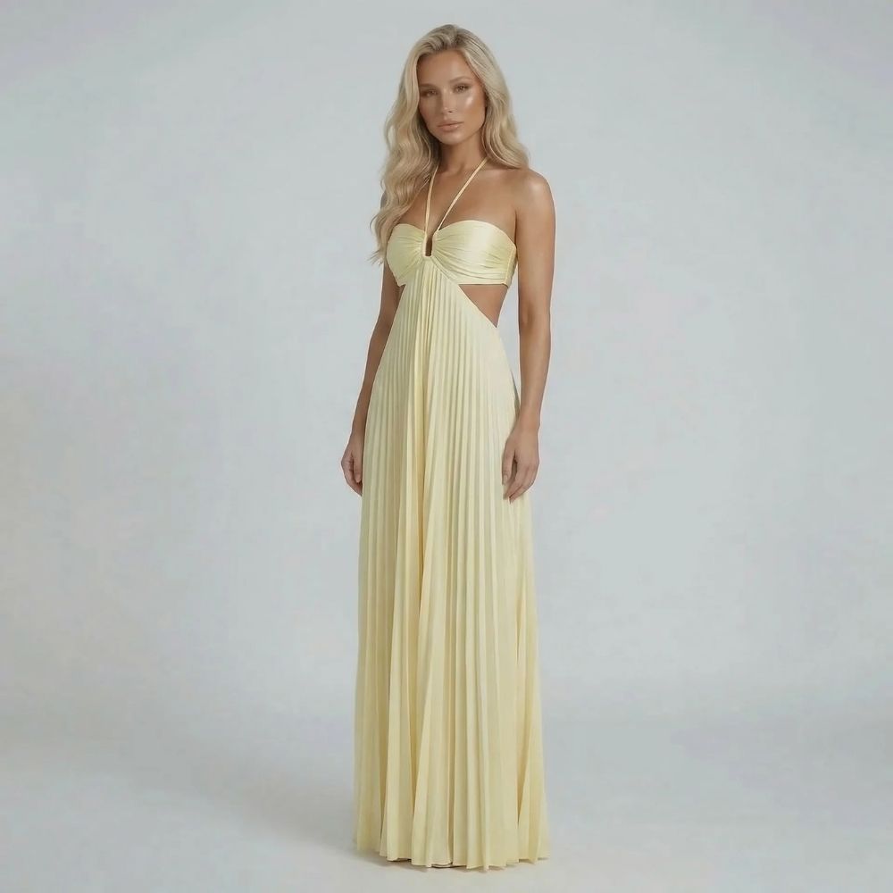 Cream pleated maxi dress with halter neckline and ruched bodice, front view.