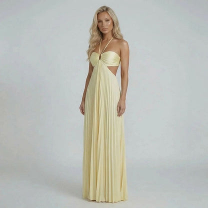 Cream pleated maxi dress with halter neckline and ruched bodice, front view.