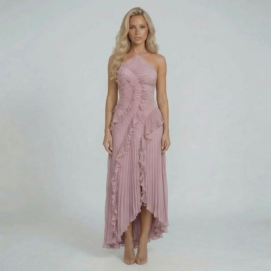 Pink pleated halter maxi dress with cascading ruffle details — front view showing flowing silhouette.