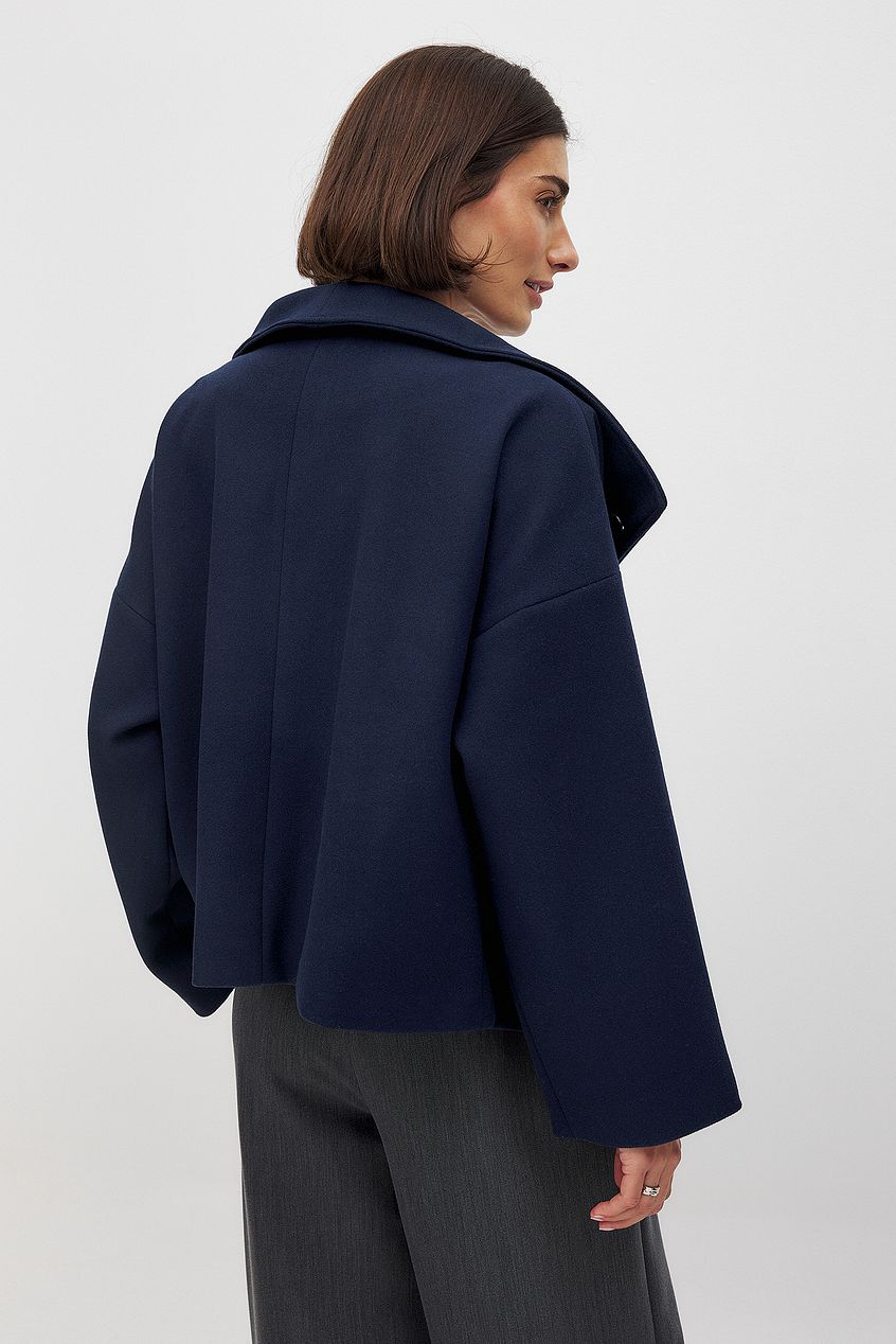 Women shawl button jacket, back view
