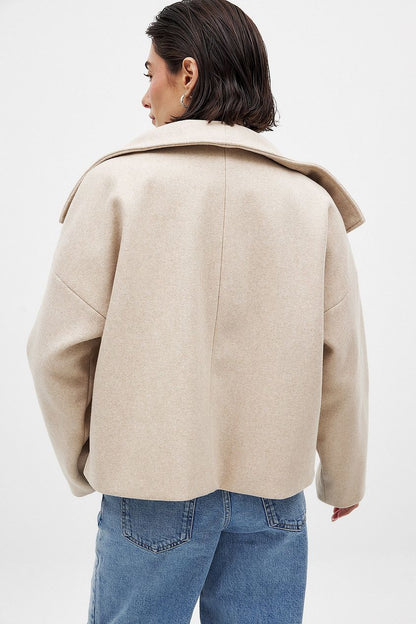 Women beige shawl button jacket, back view