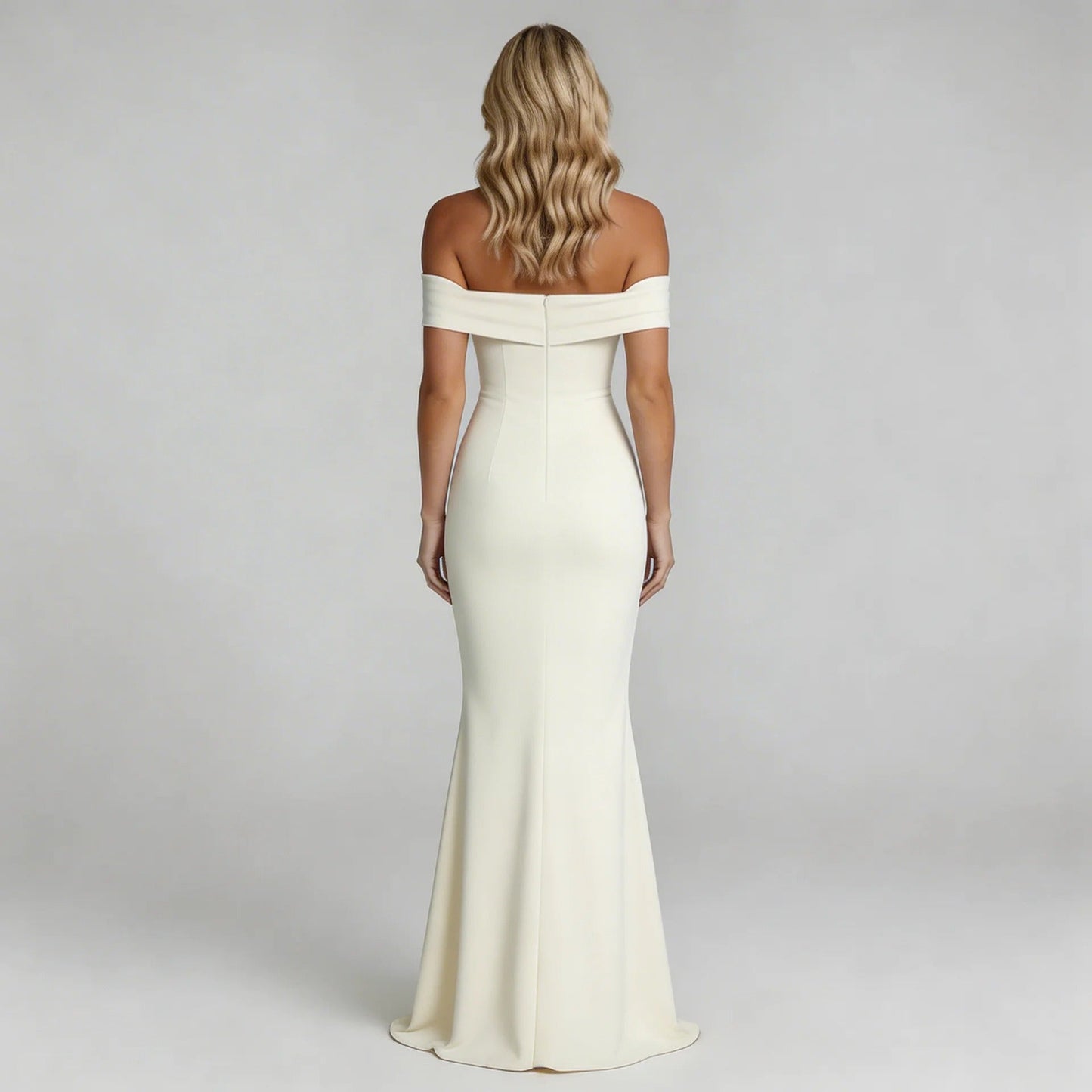 White Bardot maxi dress with zip-back detail showing elegant floor-length design — back view