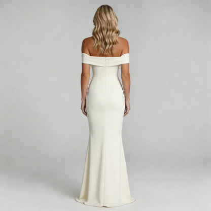 White Bardot maxi dress with zip-back detail showing elegant floor-length design — back view