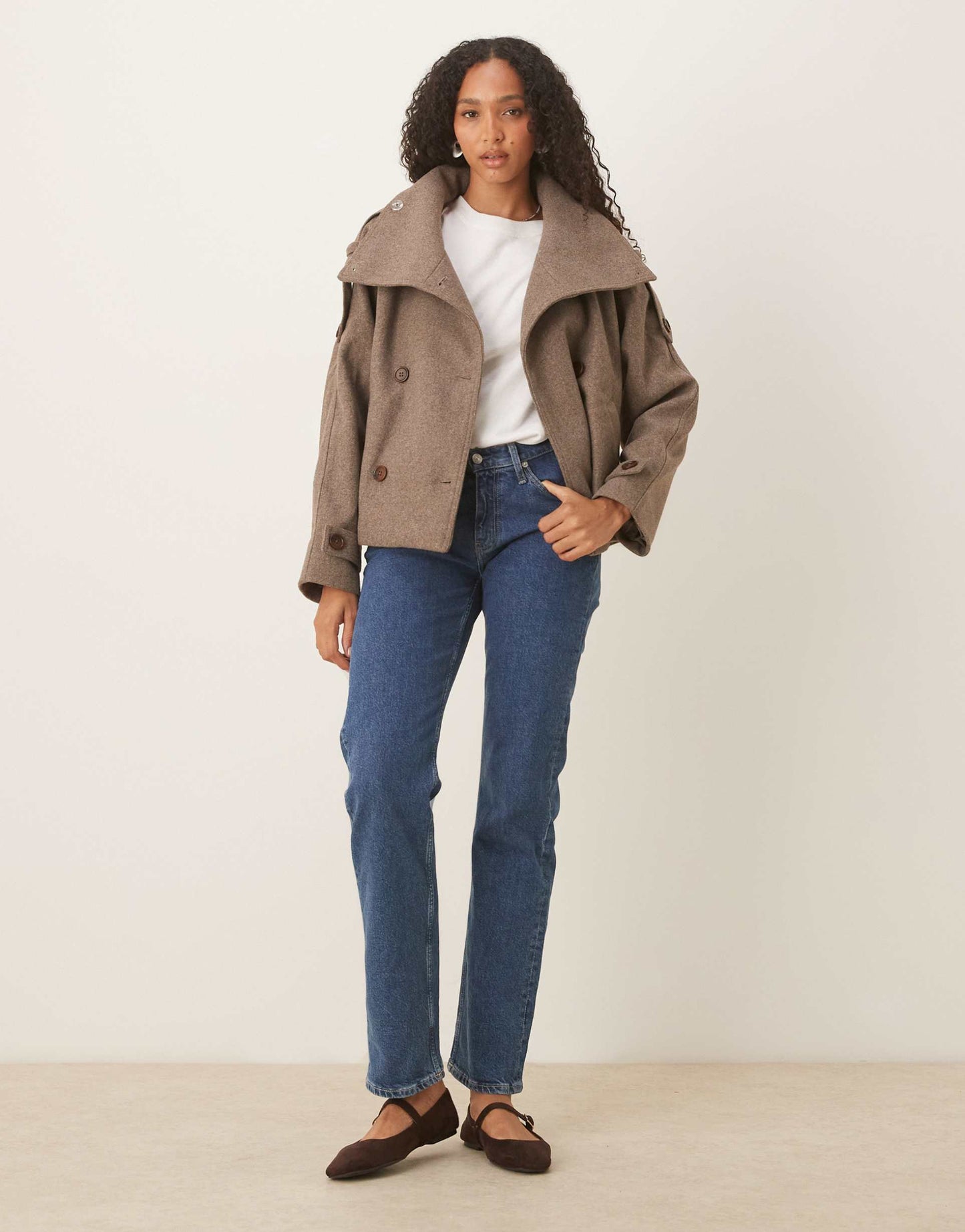 Women light brown stand collar button jacket, back view