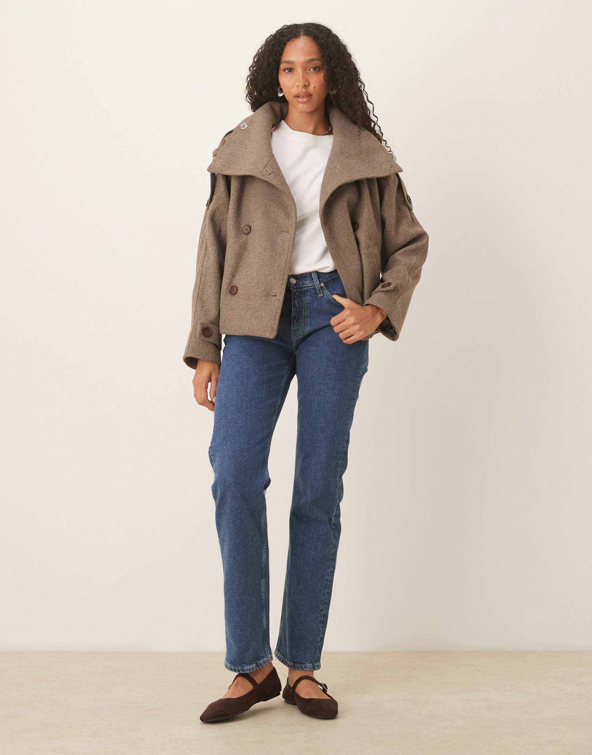 Women light brown stand collar button jacket, back view