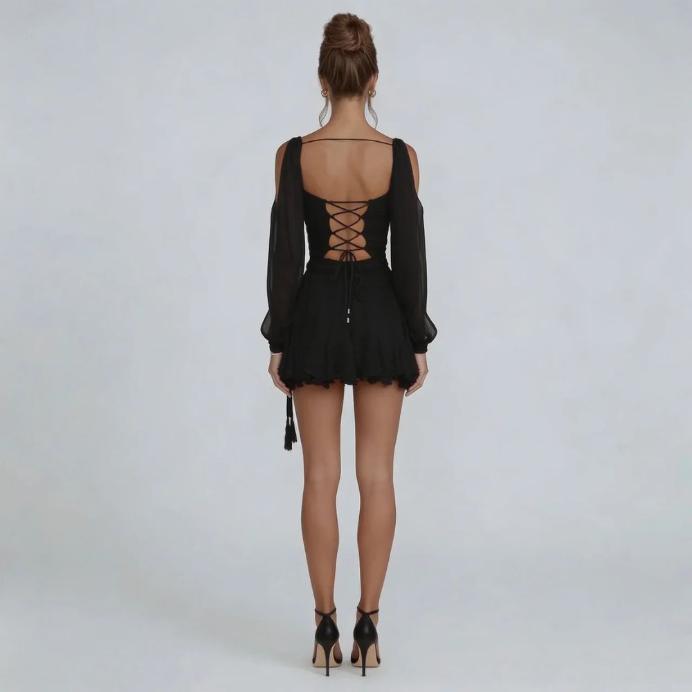 Black chiffon mini dress with corset lace-up back — back view.