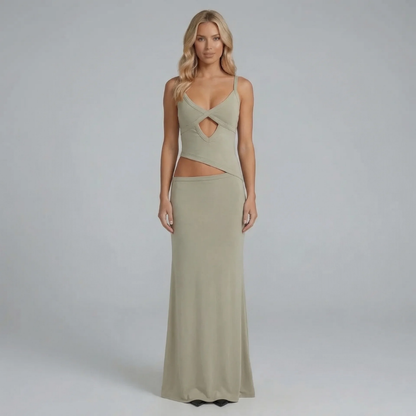 Sage cutout maxi dress with sculpted fit — front angled view on model.
