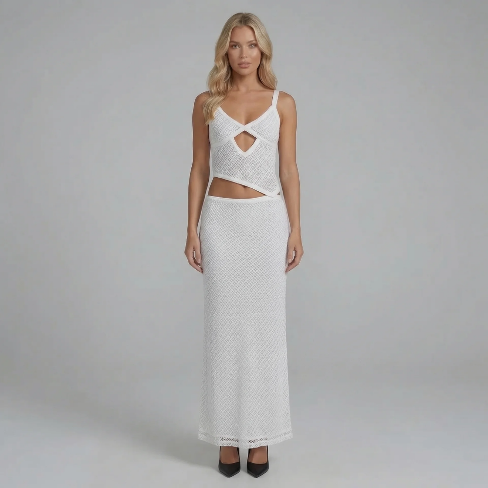 White crochet mesh maxi dress with V-neckline and cutout waist — front view.