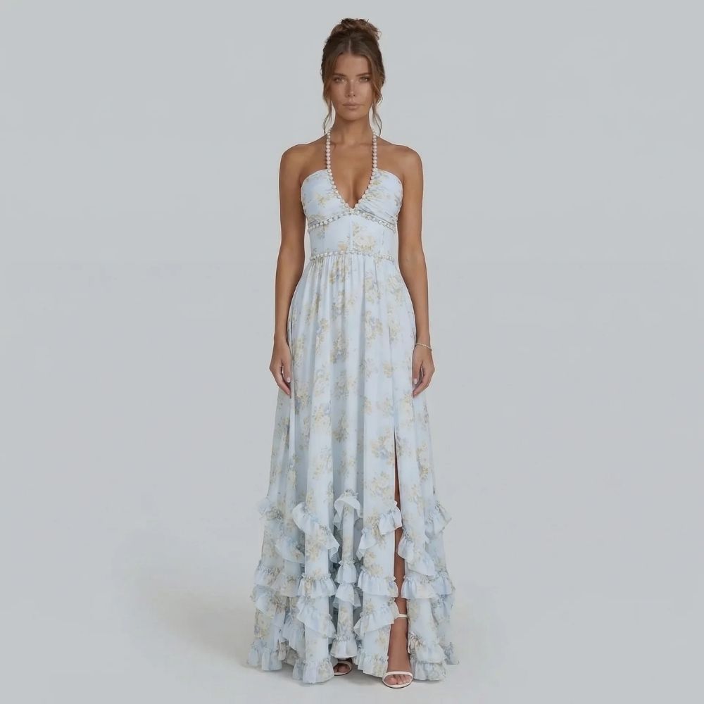White floral ruffle maxi dress styled with open neckline, front view.