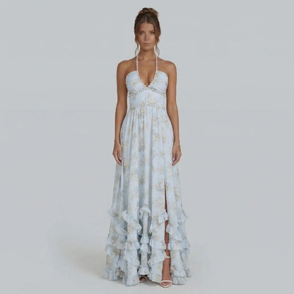 White floral ruffle maxi dress styled with open neckline, front view.
